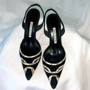 Manolo Blahnik suede black and white sling back heels.